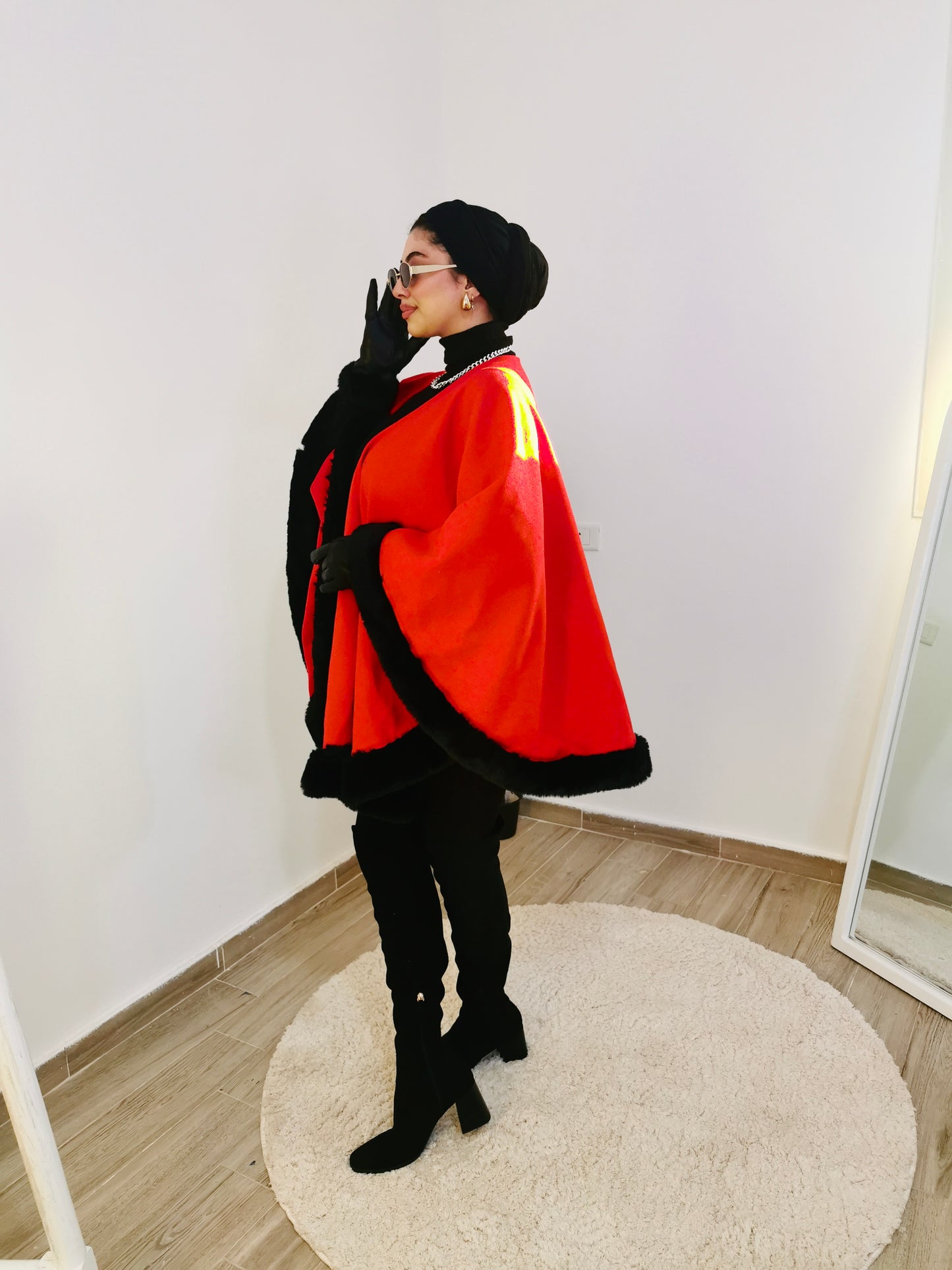 Red cape with black fur