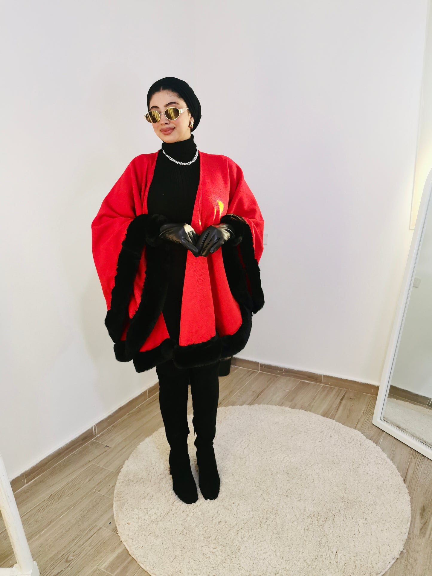 Red cape with black fur