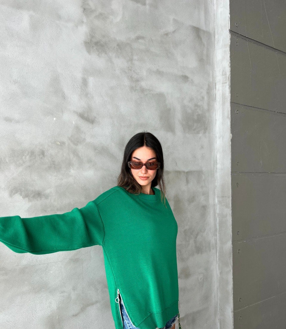 Green pullover with side zipper