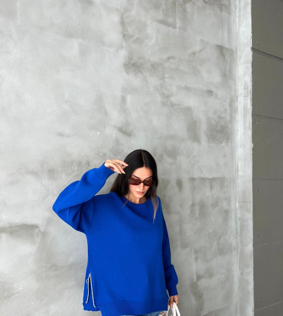 Blue pullover with side zipper